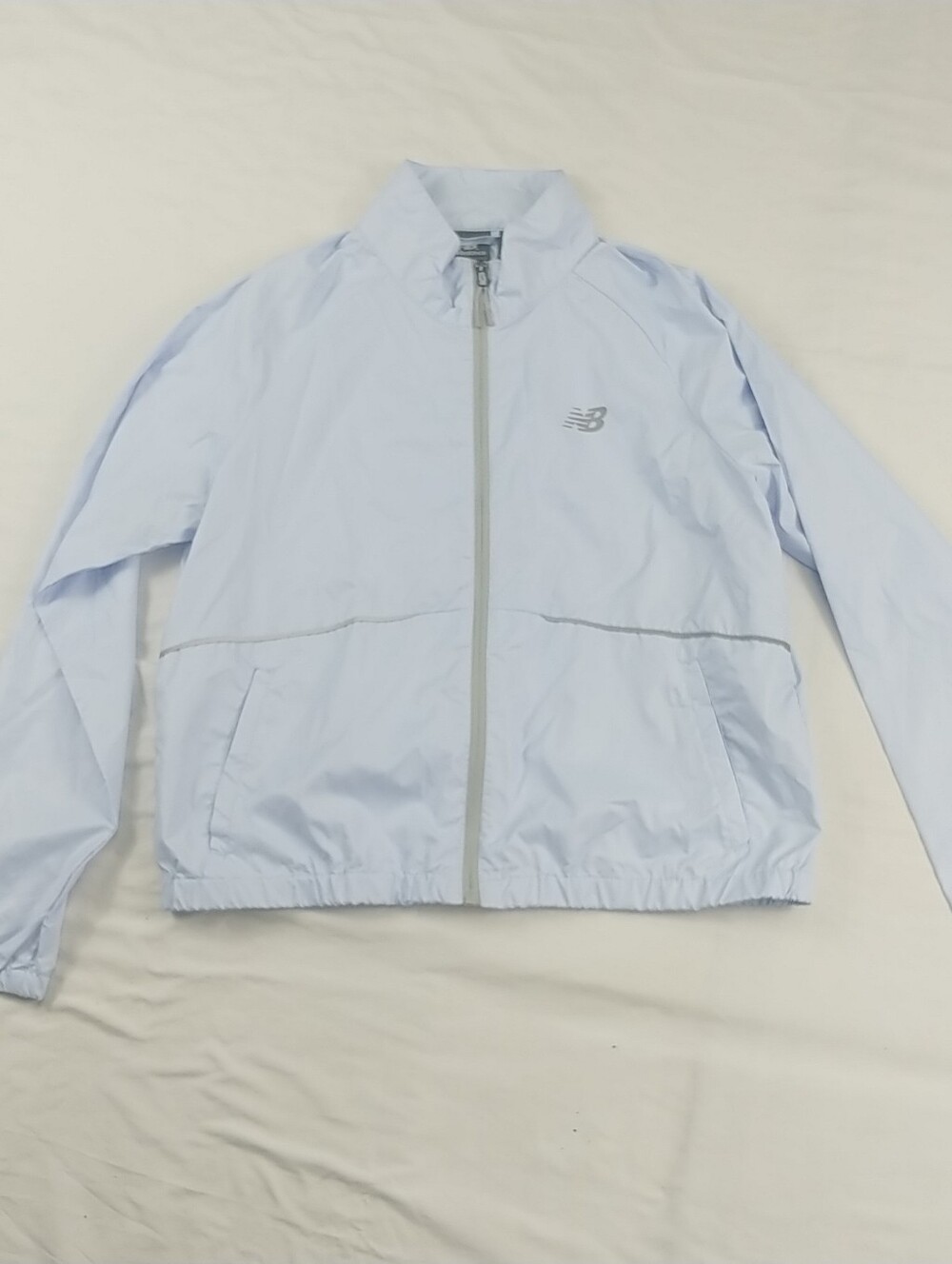 New Balance Windbreaker Women L Baby Blue Full Zip Pockets Reflective Lettering